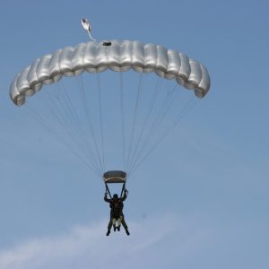 Paratec Twin Speed Tandem Reserve Canopy. Shown from the front while flying with tandem passenger