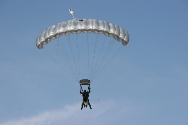 Paratec Twin Speed Tandem Reserve Canopy. Shown from the front while flying with tandem passenger