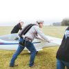 Plane pilot with standard Wingman shown from the side